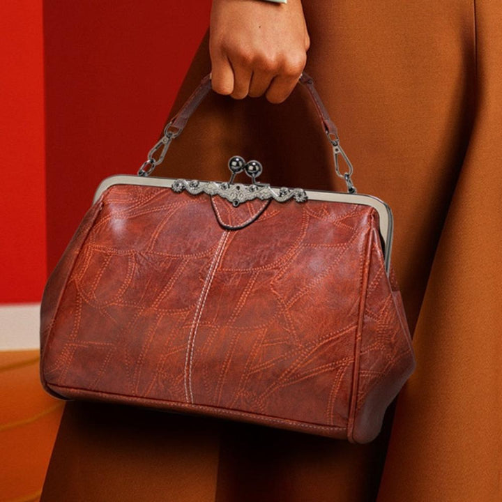 Vintage-Handtasche mit Klappverschluss