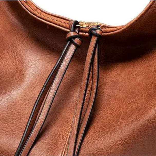 Minervas klassische Vielseitigkeit | Vintage-Tasche