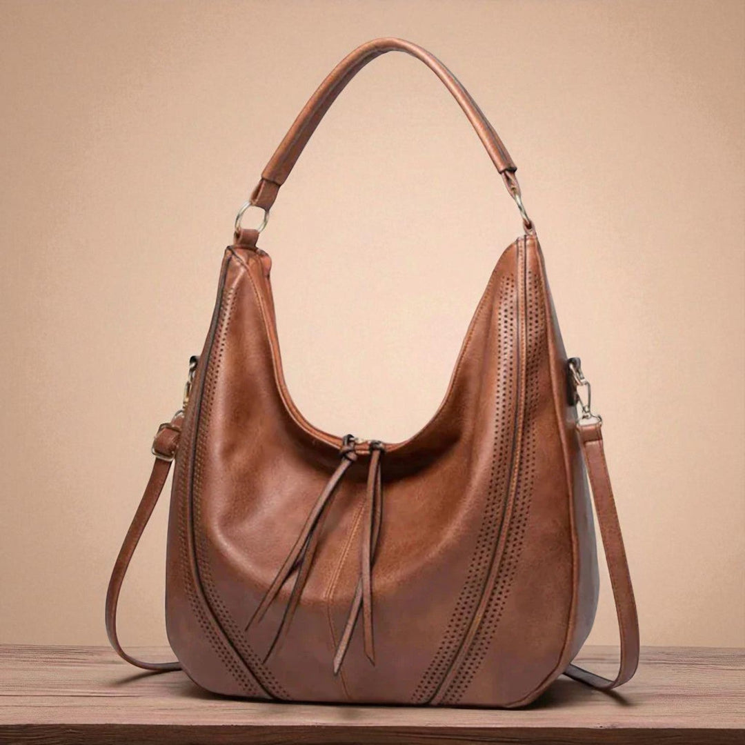Minervas klassische Vielseitigkeit | Vintage-Tasche